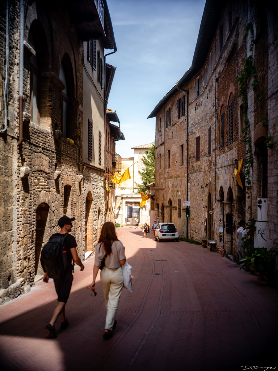 Photos from a trip through Italy in Summer of 2023. Locations include Rome, Florence, Tuscany, Castello di Bossi in Chianti, Siena, San Gimignano, Sirmione on Lake Garda, Bologna, Gudon, Italian Dolomites, Seceda, Cadini di Misurina, and Venice.